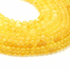 Amber plain round gold-yellow approx. 5-8mm, 1 strand