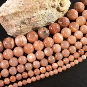 A-grade sunstone balls 4 – 16 mm, 1 strand