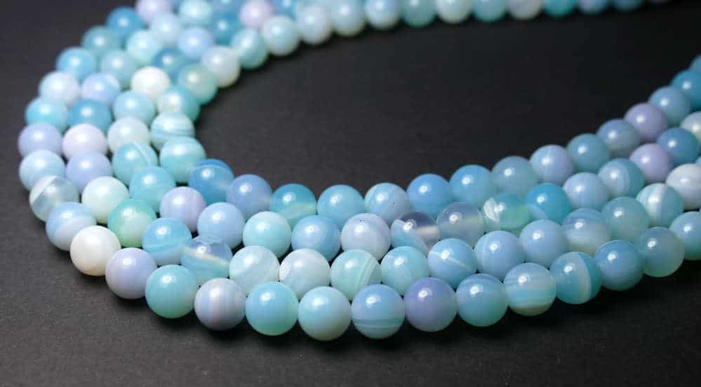 Bande de perles d'agate bleu clair 4-12mm - BACATUS Die Perlerie