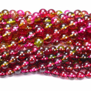 Rock crystal plain round red green 6 – 8 mm, 1 strand