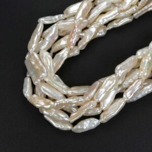 Freshwater pearls Biwa oblong cream white 6 x 27 mm, 1 strand