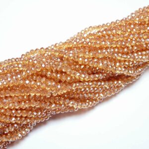 Crystal beads rondelle faceted light-orange-metallic 3 x 4 mm, 1 strand