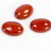 Red stone cabochon oval