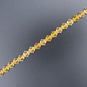 Citrine toupie facettée jaune d’or environ 6x6mm, 1 fil