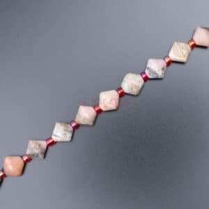 Opal bicone faceted pink approx. 8x8mm, 1 strand