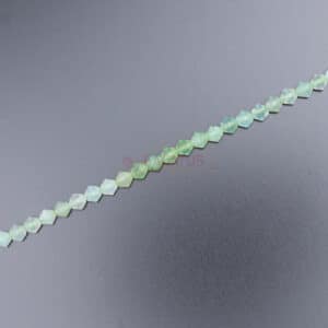Crisoprasio bicono sfaccettato verde ca. 4×4 mm, 1 capo