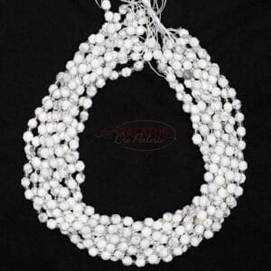 Howlite Fancy faceted white approx. 5x6mm, 1 strand