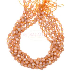 Sunstone Fancy faceted sand-colored size selection, 1 strand