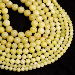 Perline di giada limone lucide di circa 2-12 mm, 1 capo